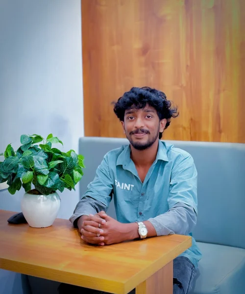 Sitting in a sofa Freelance seo expert in malappuram